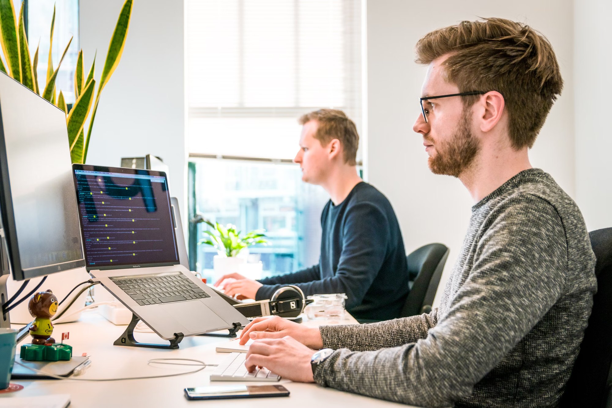 A strategist working through an audit at a desk